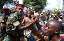 People greet soldiers as they celebrate in Bujumbura, Burundi May 13, 2015. REUTERS/Goran Tomasevic